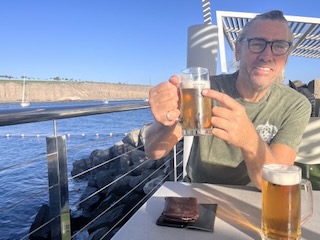 A happy Captain with a Málaga beer at La Punta Yacht Club. Day 31/44 * 25 November 2022